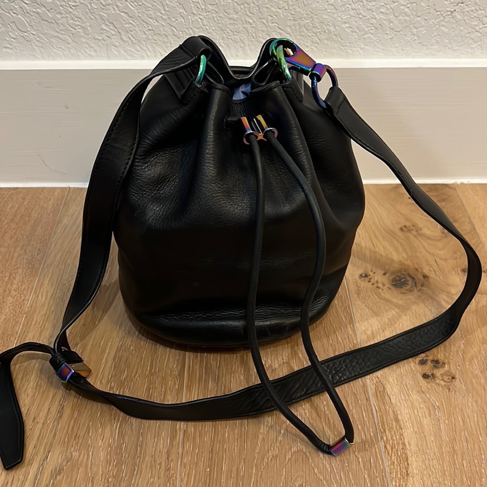 Black leather Alexander Wang bucket bag with iridescent hardware